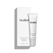 Un tubo blanco de Blemish SOS (15 mL) se encuentra junto a su caja blanca.