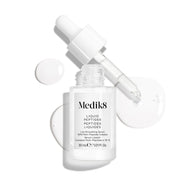 Un frasco cuentagotas de vidrio transparente del sérum Liquid Peptides se presenta con el cuentagotas retirado y colocado al lado, junto a gotas de sérum que muestran la textura del producto.