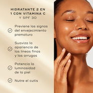 Una modelo con piel luminosa sonríe junto a una lista de beneficios del producto sobre un fondo dorado suave. El texto destaca la crema hidratante 2 en 1 con vitamina C y SPF 30:

Previene los signos del envejecimiento prematuro
Potencia la luminosidad de la piel
Hidrata el cutis
El 100 % está de acuerdo en que su piel se siente protegida durante todo el día